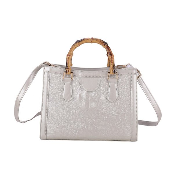 68fd134c-4971-4c07-9395-26f9e8fc4436.jpg New Fashion High-end Textile Women's Commuter Handbag